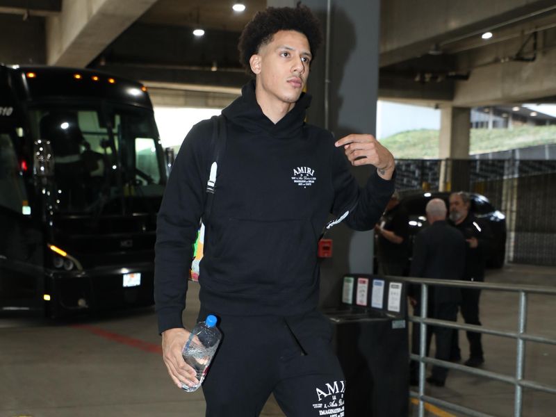 PORTLAND, OR - MARCH 13:  Jalen Johnson #1 of the Atlanta Hawks arrives to the arena before the game on March 13, 2024 at the Moda Center Arena in Portland, Oregon. NOTE TO USER: User expressly acknowledges and agrees that, by downloading and or using this photograph, user is consenting to the terms and conditions of the Getty Images License Agreement. Mandatory Copyright Notice: Copyright 2024 NBAE (Photo by Cameron Browne/NBAE via Getty Images)