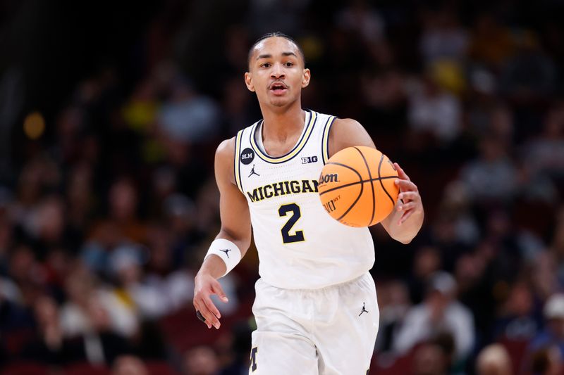 Mar 9, 2023; Chicago, IL, USA; Michigan Wolverines guard Kobe Bufkin (2) brings the ball up court against the Rutgers Scarlet Knights during the second half at United Center. Mandatory Credit: Kamil Krzaczynski-USA TODAY Sports