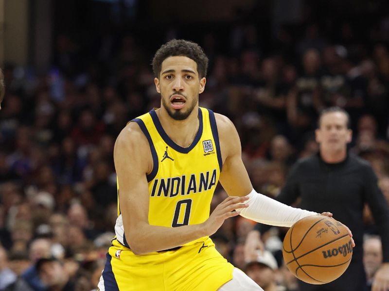 CLEVELAND, OH - MAY 13: Tyrese Haliburton #0 of the Indiana Pacers dribbles the ball during the game against the Cleveland Cavaliers during round 2 game 5 on May 13, 2025 at Rocket Mortgage FieldHouse in Cleveland, Ohio. NOTE TO USER: User expressly acknowledges and agrees that, by downloading and/or using this Photograph, user is consenting to the terms and conditions of the Getty Images License Agreement. Mandatory Copyright Notice: Copyright 2025 NBAE (Photo by  Lauren Leigh Bacho/NBAE via Getty Images)