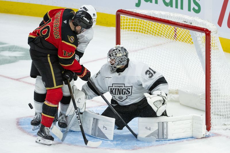 Nov 15, 2025; Ottawa, Ontario, CAN; Los Angeles Kings goalie Anton Forsberg (31) makes a save in front of Ottawa Senators right wing Drake Batherson (19) in the third period at the Canadian Tire Centre. Mandatory Credit: Marc DesRosiers-IMAGN Images