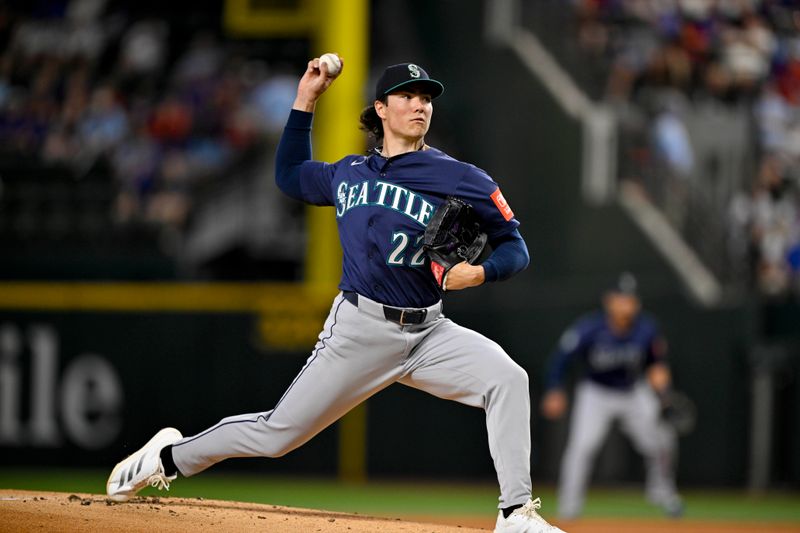 Jun 28, 2025; Arlington, Texas, USA; Seattle Mariners starting pitcher Bryan Woo (22) pitches against the Texas Rangers during the first inning at Globe Life Field. Mandatory Credit: Jerome Miron-Imagn Images