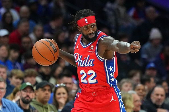 PHILADELPHIA, PENNSYLVANIA - DECEMBER 8: Patrick Beverley #22 of the Philadelphia 76ers points against the Atlanta Hawks in the second quarter at the Wells Fargo Center on December 8, 2023 in Philadelphia, Pennsylvania. The 76ers defeated the Hawks 125-114. NOTE TO USER: User expressly acknowledges and agrees that, by downloading and or using this photograph, User is consenting to the terms and conditions of the Getty Images License Agreement. (Photo by Mitchell Leff/Getty Images)