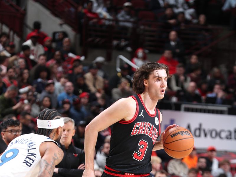 CHICAGO, IL - NOVEMBER 7: Josh Giddey #3 of the Chicago Bulls handles the ball during the game against the Minnesota Timberwolves on November 7, 2024 at United Center in Chicago, Illinois. NOTE TO USER: User expressly acknowledges and agrees that, by downloading and or using this photograph, User is consenting to the terms and conditions of the Getty Images License Agreement. Mandatory Copyright Notice: Copyright 2024 NBAE (Photo by Jeff Haynes/NBAE via Getty Images)