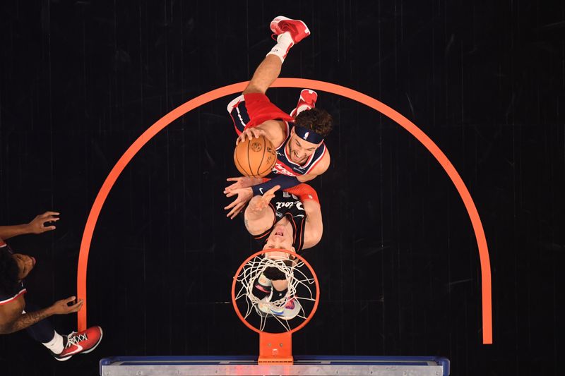 DETROIT, MI - JANUARY 27: Corey Kispert #24 of the Washington Wizards drives to the basket during the game against the Detroit Pistons on January 27, 2024 at Little Caesars Arena in Detroit, Michigan. NOTE TO USER: User expressly acknowledges and agrees that, by downloading and/or using this photograph, User is consenting to the terms and conditions of the Getty Images License Agreement. Mandatory Copyright Notice: Copyright 2024 NBAE (Photo by Chris Schwegler/NBAE via Getty Images)