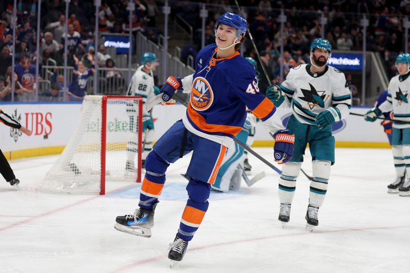 Oct 21, 2025; Elmont, New York, USA; New York Islanders defenseman Matthew Schaefer (48) celebrates his goal against the San Jose Sharks during the second period at UBS Arena. Mandatory Credit: Brad Penner-Imagn Images