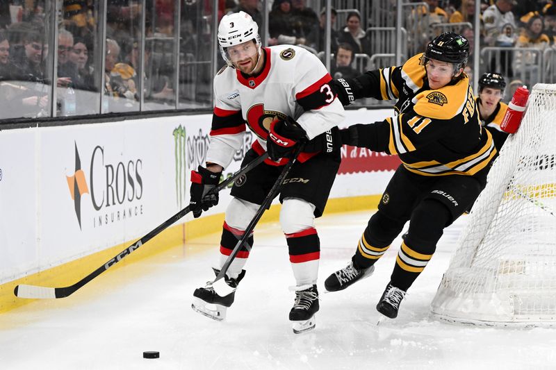 Jan 23, 2025; Boston, Massachusetts, USA; Boston Bruins center Trent Frederic (11) and Ottawa Senators defenseman Nick Jensen (3) battle for the puck during the first period at the TD Garden. Mandatory Credit: Brian Fluharty-Imagn Images