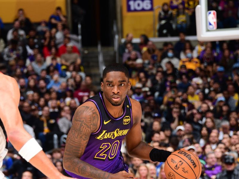 LOS ANGELES, CA - JANUARY 2: Shake Milton #20 of the Los Angeles Lakers dribbles the ball during the game against the Portland Trail Blazers on January 2, 2025 at Crypto.Com Arena in Los Angeles, California. NOTE TO USER: User expressly acknowledges and agrees that, by downloading and/or using this Photograph, user is consenting to the terms and conditions of the Getty Images License Agreement. Mandatory Copyright Notice: Copyright 2025 NBAE (Photo by Adam Pantozzi/NBAE via Getty Images)