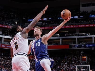 SACRAMENTO, CA - DECEMBER 2: Domantas Sabonis #10 of the Sacramento Kings shoots the ball during the game against the Denver Nuggets on December 2, 2023 at Golden 1 Center in Sacramento, California. NOTE TO USER: User expressly acknowledges and agrees that, by downloading and or using this Photograph, user is consenting to the terms and conditions of the Getty Images License Agreement. Mandatory Copyright Notice: Copyright 2023 NBAE (Photo by Rocky Widner/NBAE via Getty Images)