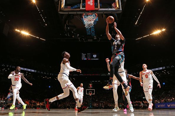 BROOKLYN, NY - DECEMBER 20: Cameron Johnson #2 of the Brooklyn Nets drives to the basket during the game against the New York Knicks on December 20, 2023 at Barclays Center in Brooklyn, New York. NOTE TO USER: User expressly acknowledges and agrees that, by downloading and or using this Photograph, user is consenting to the terms and conditions of the Getty Images License Agreement. Mandatory Copyright Notice: Copyright 2023 NBAE (Photo by Nathaniel S. Butler/NBAE via Getty Images)