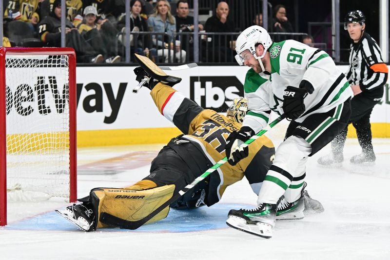 Apr 27, 2024; Las Vegas, Nevada, USA; Vegas Golden Knights goaltender Logan Thompson (36) stops a shot from Dallas Stars center Tyler Seguin (91) in the second period in game three of the first round of the 2024 Stanley Cup Playoffs at T-Mobile Arena. Mandatory Credit: Candice Ward-USA TODAY Sports