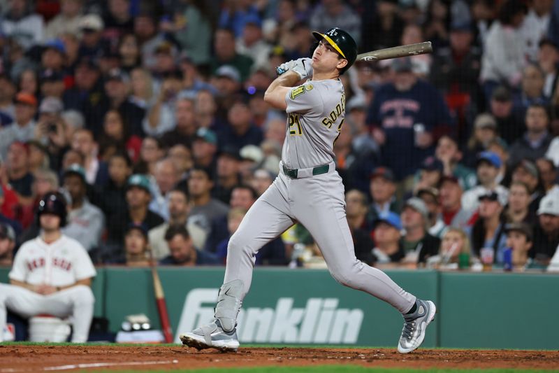 Sep 16, 2025; Boston, Massachusetts, USA; Athletics left fielder Tyler Soderstrom (21) hits an RBI double during the sixth inning against the Boston Red Sox at Fenway Park. Mandatory Credit: Paul Rutherford-Imagn Images