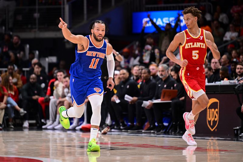 ATLANTA, GA - November 6:  Jalen Brunson #11 of the New York Knicks gestures during the game against the Atlanta Hawks on November 6, 2024 at State Farm Arena in Atlanta, Georgia.  NOTE TO USER: User expressly acknowledges and agrees that, by downloading and/or using this Photograph, user is consenting to the terms and conditions of the Getty Images License Agreement. Mandatory Copyright Notice: Copyright 2024 NBAE (Photo by Adam Hagy/NBAE via Getty Images)