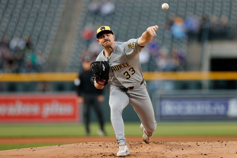 Apr 9, 2025; Denver, Colorado, USA; Milwaukee Brewers starting pitcher Tyler Alexander (33) pitches in the first inning against the Colorado Rockies at Coors Field. Mandatory Credit: Isaiah J. Downing-Imagn Images