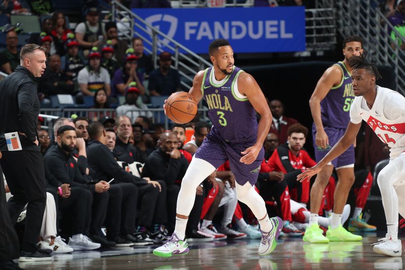 NEW ORLEANS, LA - NOVEMBER 27:  CJ McCollum #3 of the New Orleans Pelicans dribbles the ball during the game against the Toronto Raptors during a regular season game on November 27, 2024 at the Smoothie King Center in New Orleans, Louisiana. NOTE TO USER: User expressly acknowledges and agrees that, by downloading and or using this Photograph, user is consenting to the terms and conditions of the Getty Images License Agreement. Mandatory Copyright Notice: Copyright 2024 NBAE (Photo by Layne Murdoch Jr./NBAE via Getty Images)