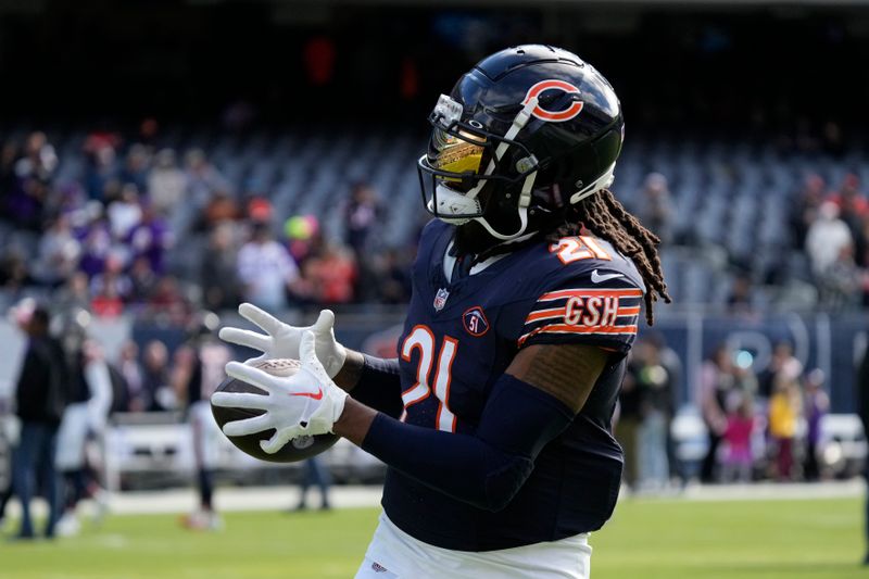 Chicago Bears running back D'Onta Foreman catches during warmups before an NFL football game against the Minnesota Vikings, Sunday, Oct. 15, 2023, in Chicago. (AP Photo/Nam Y. Huh)