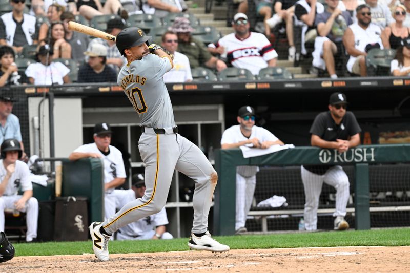 Jul 13, 2024; Chicago, Illinois, USA;  Pittsburgh Pirates outfielder Bryan Reynolds (10)  hits a two RBI single against the Chicago White Sox during the seventh inning at Guaranteed Rate Field. Mandatory Credit: Matt Marton-USA TODAY Sports