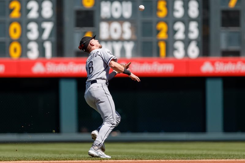 Aug 20, 2023; Denver, Colorado, USA; Chicago White Sox second baseman Zach Remillard (28) is unable to make a catch in the first inning against the Colorado Rockies at Coors Field. Mandatory Credit: Isaiah J. Downing-USA TODAY Sports