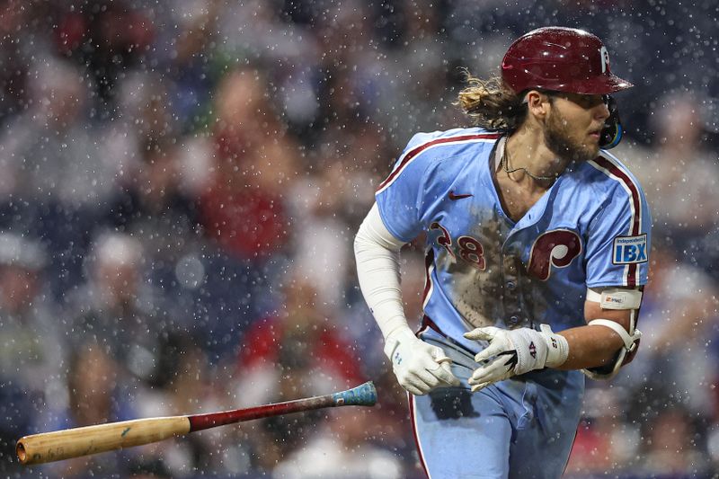 Sep 25, 2025; Philadelphia, Pennsylvania, USA; Philadelphia Phillies third base Alec Bohm (28) hits a single against the Miami Marlins during the eighth inning at Citizens Bank Park. Mandatory Credit: Bill Streicher-Imagn Images
