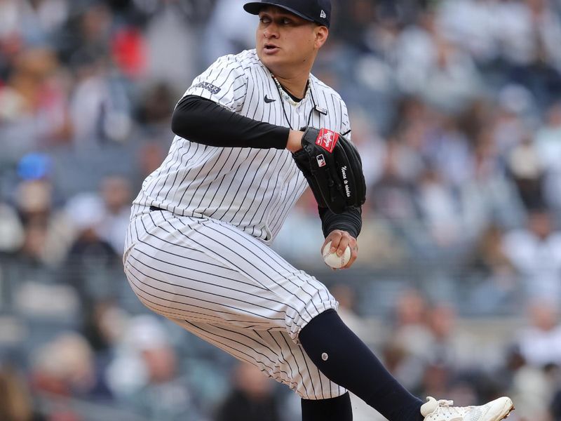 Apr 21, 2024; Bronx, New York, USA; New York Yankees relief pitcher Victor Gonzalez (47) pitches against the Tampa Bay Rays during the ninth inning at Yankee Stadium. Mandatory Credit: Brad Penner-USA TODAY Sports