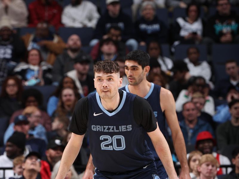 MEMPHIS, TN - JANUARY 29:  Matthew Hurt #20 of the Memphis Grizzles plays defense against the Sacramento Kings on January 29, 2024 at FedExForum in Memphis, Tennessee. NOTE TO USER: User expressly acknowledges and agrees that, by downloading and or using this photograph, User is consenting to the terms and conditions of the Getty Images License Agreement. Mandatory Copyright Notice: Copyright 2024 NBAE (Photo by Joe Murphy/NBAE via Getty Images)