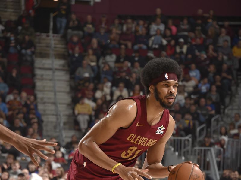 CLEVELAND, OH - JANUARY 5: Jarrett Allen #31 of the Cleveland Cavaliers handles the ball during the game against the Charlotte Hornets on January 5, 2025 at Rocket Mortgage FieldHouse in Cleveland, Ohio. NOTE TO USER: User expressly acknowledges and agrees that, by downloading and/or using this Photograph, user is consenting to the terms and conditions of the Getty Images License Agreement. Mandatory Copyright Notice: Copyright 2025 NBAE (Photo by David Liam Kyle/NBAE via Getty Images)