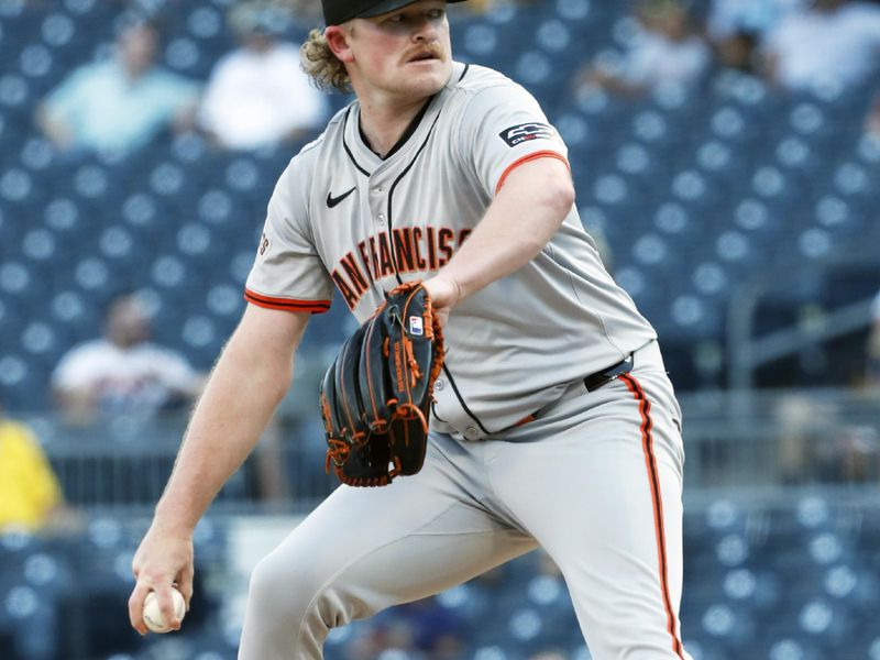 May 21, 2024; Pittsburgh, Pennsylvania, USA;  San Francisco Giants starting pitcher Logan Webb (62) delivers a pitch against the Pittsburgh Pirates during the first inning at PNC Park. Mandatory Credit: Charles LeClaire-USA TODAY Sports