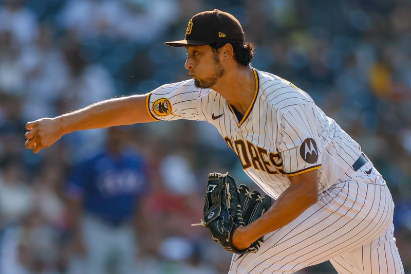 Jul 29, 2023; San Diego, California, USA; San Diego Padres starting pitcher Yu Darvish (11) throws a pitch in the first inning against the Texas Rangers at Petco Park. Mandatory Credit: David Frerker-USA TODAY Sports