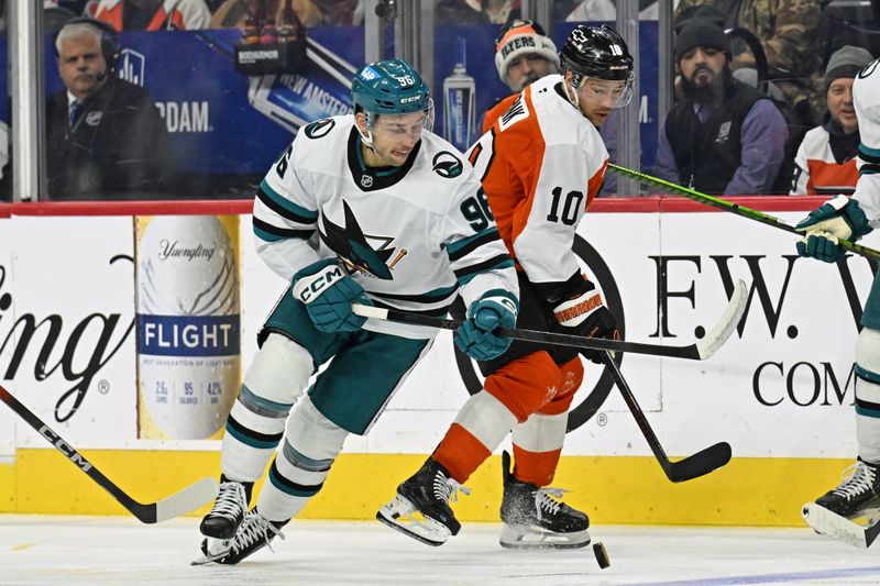 Dec 9, 2025; Philadelphia, Pennsylvania, USA; San Jose Sharks center Philipp Kurashev (96) and Philadelphia Flyers right wing Bobby Brink (10) battle for the puck during the first period at Xfinity Mobile Arena. Mandatory Credit: Eric Hartline-Imagn Images Dec 9, 2025; Philadelphia, Pennsylvania, USA; San Jose Sharks center Philipp Kurashev (96) and Philadelphia Flyers right wing Bobby Brink (10) battle for the puck during the first period at Xfinity Mobile Arena. Mandatory Credit: Eric Hartline-Imagn Images