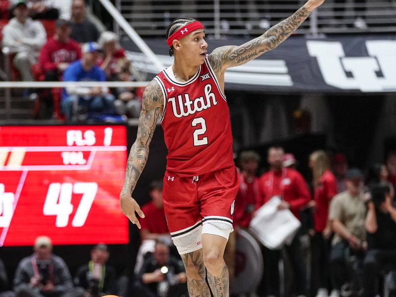 Jan 10, 2026; Salt Lake City, Utah, USA; Utah Utes guard Terrence Brown (2) dribbles the ball during the second half  against the BYU Cougars at Jon M. Huntsman Center. Mandatory Credit: Aaron Baker-Imagn Images