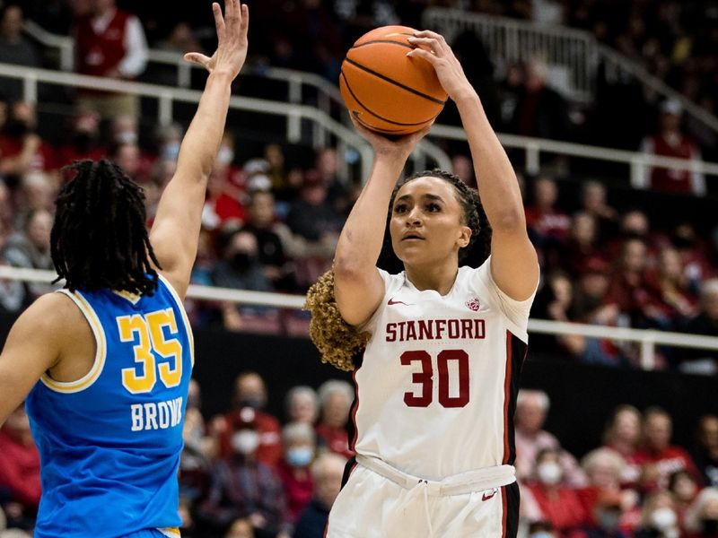 Feb 20, 2023; Stanford, California, USA;  Stanford Cardinal guard Haley Jones (30) shoots over UCLA Bruins guard Camryn Brown (35) during the first half at Maples Pavilion. Mandatory Credit: John Hefti-USA TODAY Sports