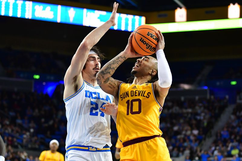 Mar 2, 2023; Los Angeles, California, USA; Arizona State Sun Devils guard Frankie Collins (10) moves to the basket against UCLA Bruins guard Jaime Jaquez Jr. (24) during the first half at Pauley Pavilion. Mandatory Credit: Gary A. Vasquez-USA TODAY Sports