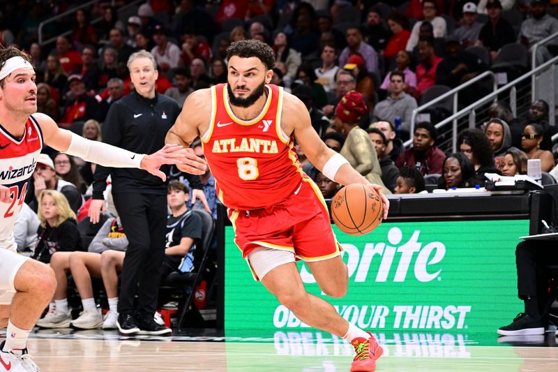 ATLANTA, GA - OCTOBER 28:  David Roddy #8 of the Atlanta Hawks drives to the basket during the game on October 28, 2024 at State Farm Arena in Atlanta, Georgia.  NOTE TO USER: User expressly acknowledges and agrees that, by downloading and/or using this Photograph, user is consenting to the terms and conditions of the Getty Images License Agreement. Mandatory Copyright Notice: Copyright 2024 NBAE (Photo by Adam Hagy/NBAE via Getty Images)