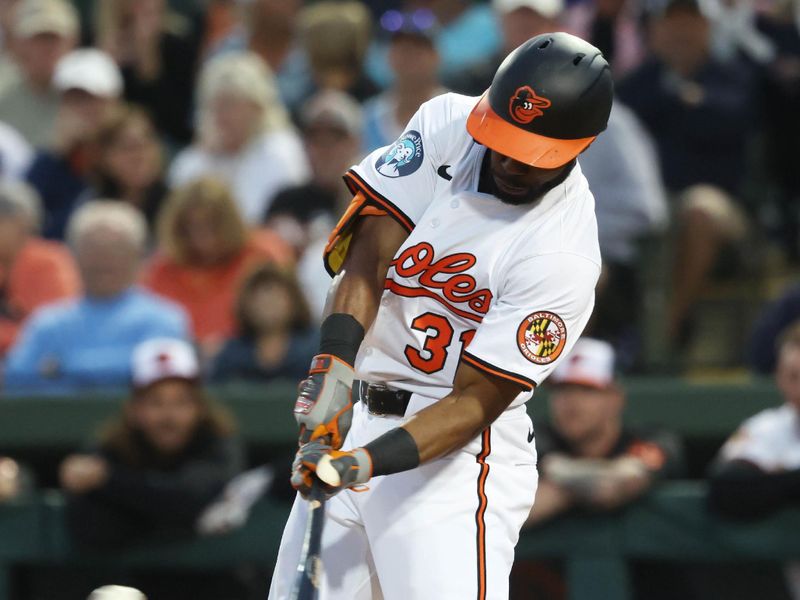 Mar 20, 2025; Sarasota, Florida, USA;  Baltimore Orioles outfielder Cedric Mullins (31) singles during the third inning against the New York Yankees at Ed Smith Stadium. Mandatory Credit: Kim Klement Neitzel-Imagn Images