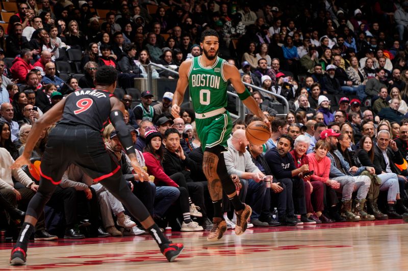 TORONTO, CANADA - JANUARY 15: Jayson Tatum #0 of the Boston Celtics handles the ball during the game against the Toronto Raptors  on January 15, 2024 at the Scotiabank Arena in Toronto, Ontario, Canada.  NOTE TO USER: User expressly acknowledges and agrees that, by downloading and or using this Photograph, user is consenting to the terms and conditions of the Getty Images License Agreement.  Mandatory Copyright Notice: Copyright 2024 NBAE (Photo by Mark Blinch/NBAE via Getty Images)