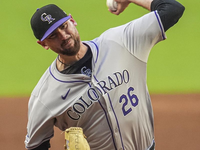 Sep 5, 2024; Cumberland, Georgia, USA; Colorado Rockies starting pitcher Austin Gomber (26) pitches against the Atlanta Braves at Truist Park. Mandatory Credit: Dale Zanine-Imagn Images