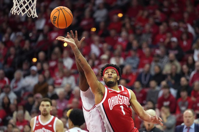 Feb 13, 2024; Madison, Wisconsin, USA;  Ohio State Buckeyes guard Roddy Gayle Jr. (1) scores against Wisconsin Badgers guard AJ Storr (2) during the first half at the Kohl Center. Mandatory Credit: Kayla Wolf-USA TODAY Sports