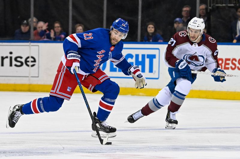 Feb 5, 2024; New York, New York, USA;  New York Rangers center Barclay Goodrow (21) skates with the puck against the Colorado Avalanche during the first period at Madison Square Garden. Mandatory Credit: Dennis Schneidler-USA TODAY Sports