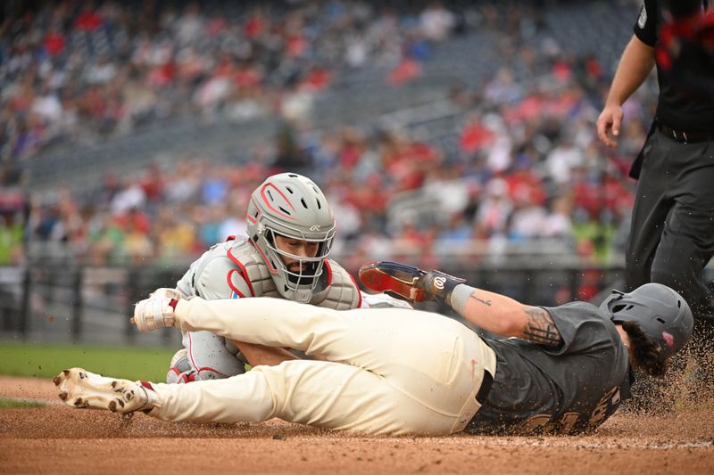 Sep 29, 2024; Washington, District of Columbia, USA; Philadelphia Phillies catcher Garrett Stubbs (21) throws out Washington Nationals right fielder Dylan Crews (3) at home plate during the second inning at Nationals Park. Mandatory Credit: Rafael Suanes-Imagn Images