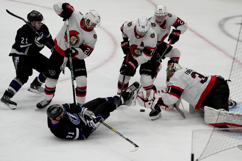 Feb 19, 2024; Tampa, Florida, USA; Ottawa Senators goalie Anton  Forsberg defends the goal against Tampa Bay Lightning center Steven Stamkos (91) during the first period at Amalie Arena. Mandatory Credit: Dave Nelson-USA TODAY Sports