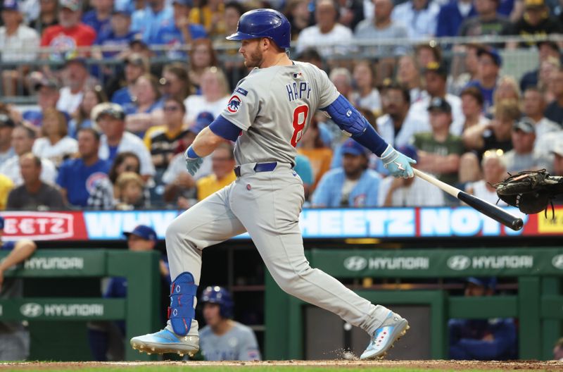 Sep 15, 2025; Pittsburgh, Pennsylvania, USA;  Chicago Cubs left fielder Ian Happ (8) hits a single against the Pittsburgh Pirates during the third inning at PNC Park. Mandatory Credit: Charles LeClaire-Imagn Images