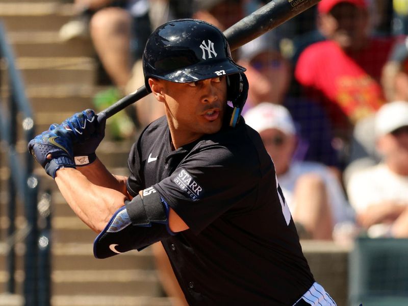 Feb 26, 2024; Tampa, Florida, USA;  New York Yankees designated hitter Giancarlo Stanton (27)  at bat during the fourth inning against the Minnesota Twins at George M. Steinbrenner Field. Mandatory Credit: Kim Klement Neitzel-USA TODAY Sports