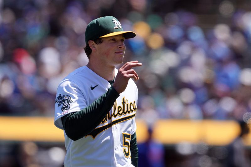 Apr 19, 2023; Oakland, California, USA; Oakland Athletics starting pitcher Mason Miller (57) gestures after being removed from the game against the Chicago Cubs during the fifth inning at Oakland-Alameda County Coliseum. Mandatory Credit: Darren Yamashita-USA TODAY Sports