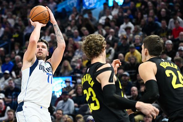 SALT LAKE CITY, UTAH - JANUARY 01: Luka Doncic #77 of the Dallas Mavericks shoots during the second half of a game against the Utah Jazz at Delta Center on January 01, 2024 in Salt Lake City, Utah. NOTE TO USER: User expressly acknowledges and agrees that, by downloading and or using this photograph, User is consenting to the terms and conditions of the Getty Images License Agreement. (Photo by Alex Goodlett/Getty Images)