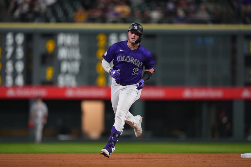 Sep 16, 2024; Denver, Colorado, USA; Colorado Rockies outfielder Hunter Goodman (15) runs off a solo home run in the seventh inning against the Arizona Diamondbacks at Coors Field. Mandatory Credit: Ron Chenoy-Imagn Images