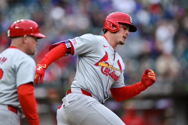 Apr 27, 2024; New York City, New York, USA; St. Louis Cardinals second baseman Nolan Gorman (16) hits a RBI triple during the third inning against the New York Mets at Citi Field. Mandatory Credit: John Jones-USA TODAY Sports