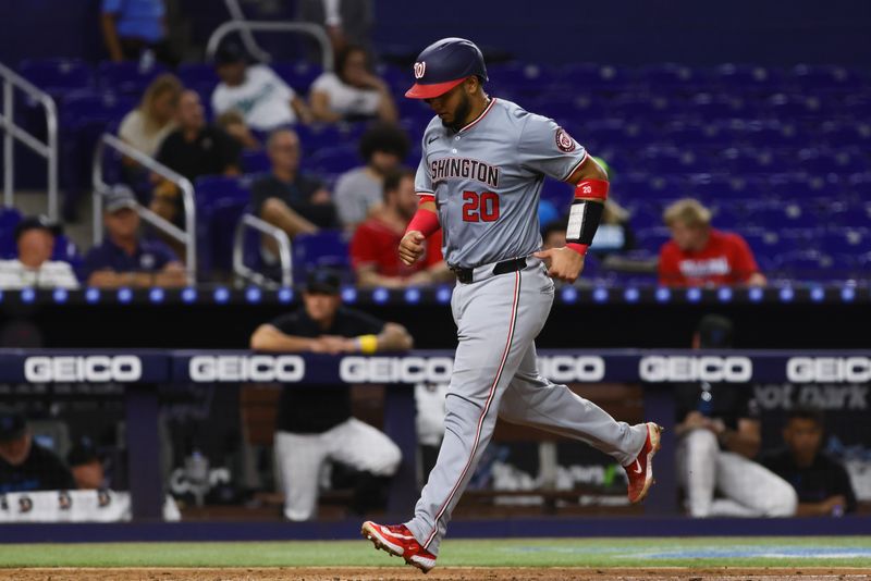 Sep 4, 2024; Miami, Florida, USA; Washington Nationals catcher Keibert Ruiz (20) scores against the Miami Marlins during the eighth inning at loanDepot Park. Mandatory Credit: Sam Navarro-Imagn Images