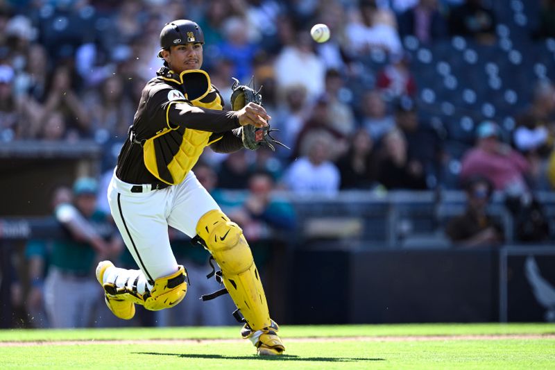 Mar 26, 2024; San Diego, California, USA; San Diego Padres catcher Ethan Salas (88) throws to first base during the ninth inning against the Seattle Mariners at Petco Park. Mandatory Credit: Orlando Ramirez-USA TODAY Sports