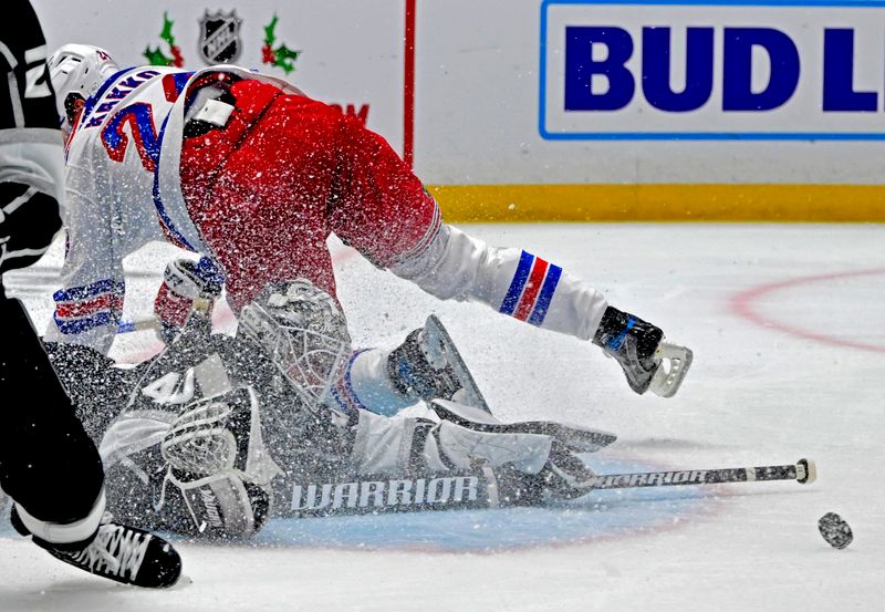 Nov 22, 2022; Los Angeles, California, USA;  Los Angeles Kings goaltender Cal Petersen (40) makes a save off a shot on goal by New York Rangers right wing Kaapo Kakko (24) in the third period at Crypto.com Arena. Mandatory Credit: Jayne Kamin-Oncea-USA TODAY Sports