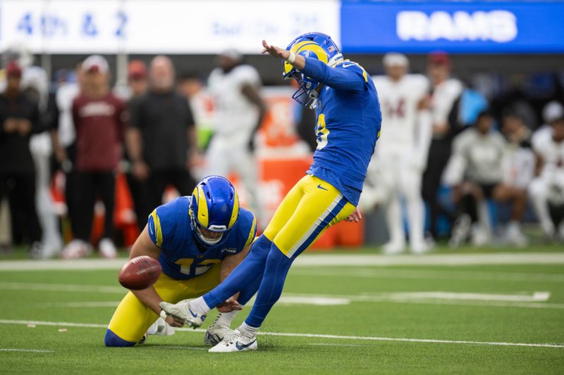 Los Angeles Rams place kicker Brett Maher (8) kicks during an NFL football game against the Arizona Cardinals, Sunday, Oct. 15, 2023, in Inglewood, Calif. (AP Photo/Kyusung Gong)