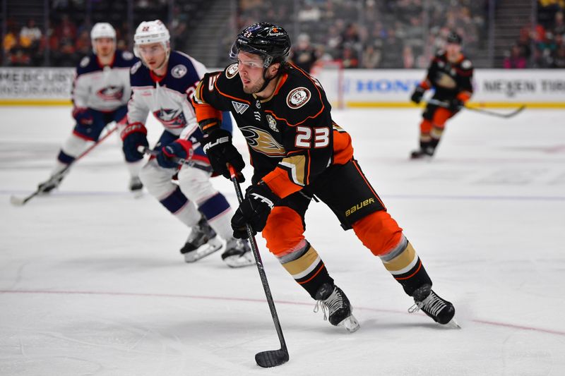 Feb 21, 2024; Anaheim, California, USA; Anaheim Ducks center Mason McTavish (23) moves in for a shot on goal against the Columbus Blue Jackets during the first period at Honda Center. Mandatory Credit: Gary A. Vasquez-USA TODAY Sports